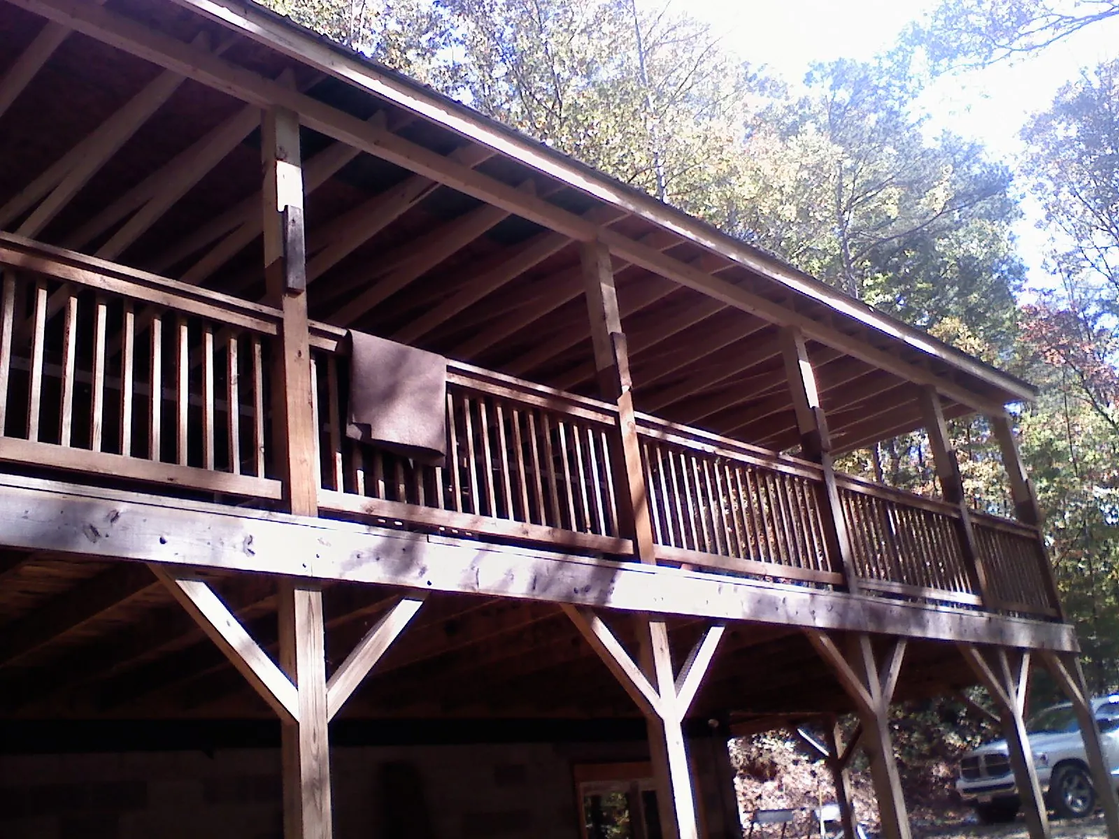 Timber framing under a new elevated porch and deck — Roof Leak Repair in Swan Lake by Roofing Brothers